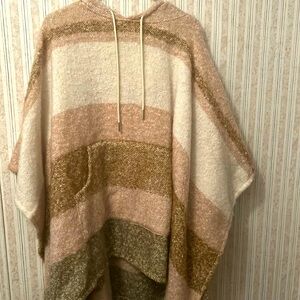 A cover up with a with pocket and a hood